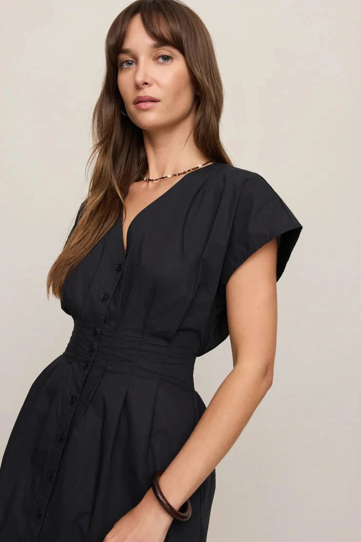 Black poplin mini dress with smocked back waist