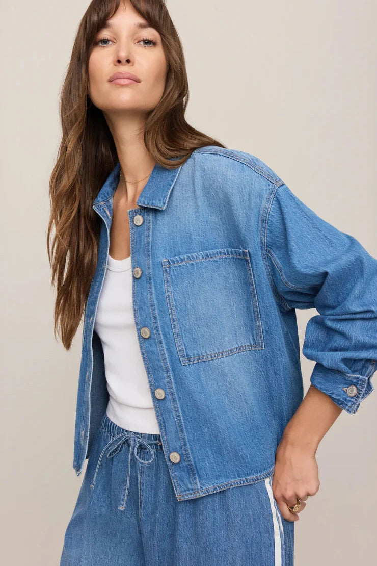 Light wash cropped denim jacket with oversized patch pockets