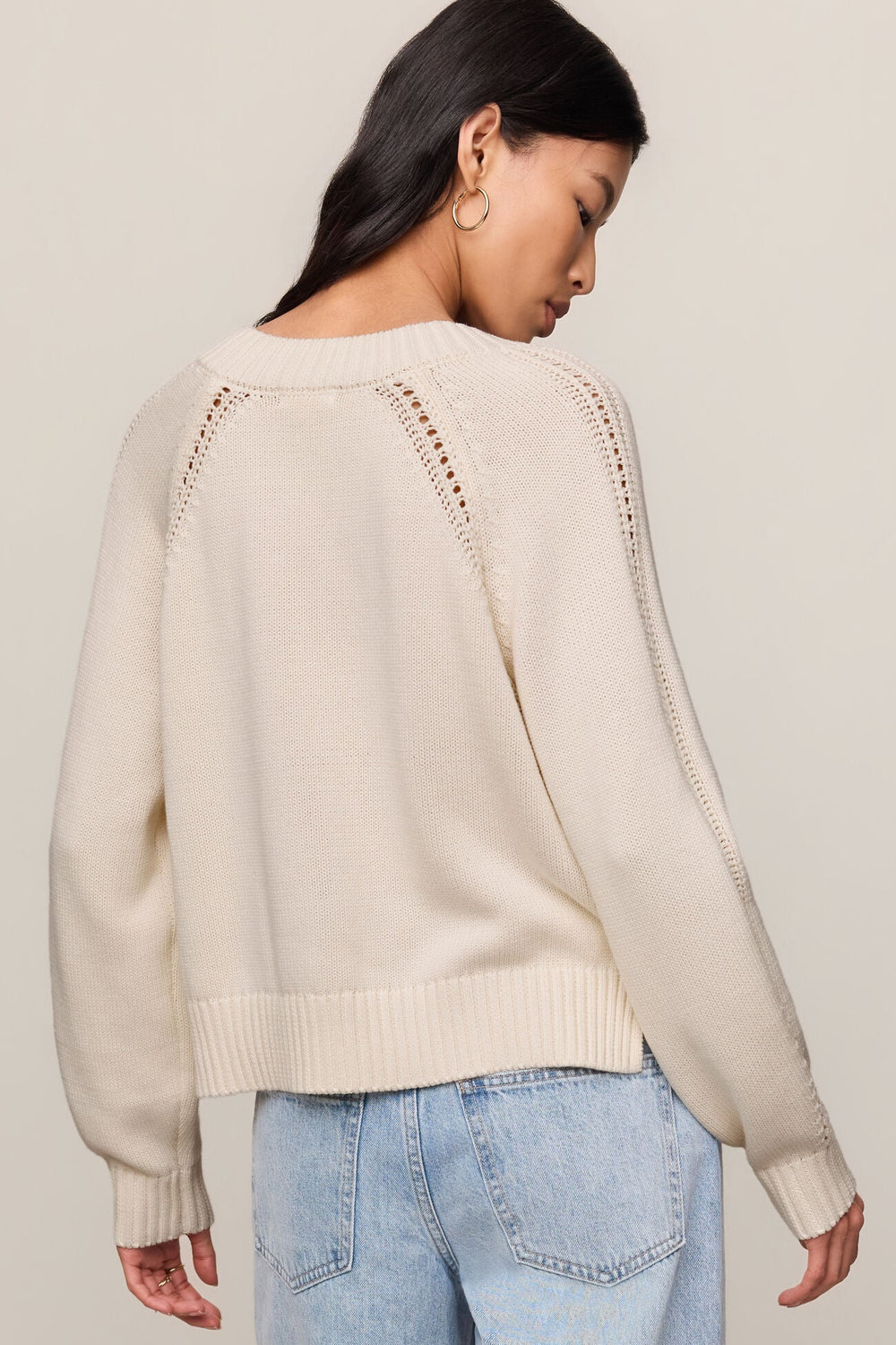 Ivory V-neck cotton sweater with pointelle detail