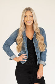 Classic denim jacket with buttons and distressed medium wash