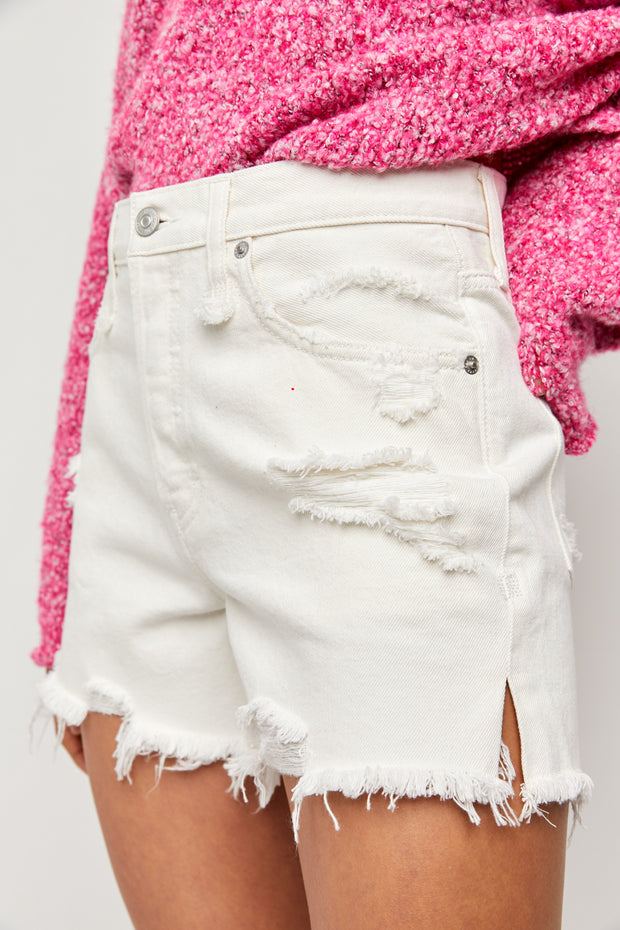 White high rise distressed denim jean shorts with slits on the side