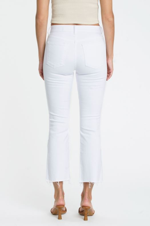 Back view of white cropped flare jeans with raw hem at the bottom
